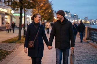 Мужчина и женщина 30-40 лет разговаривают, держась за руки